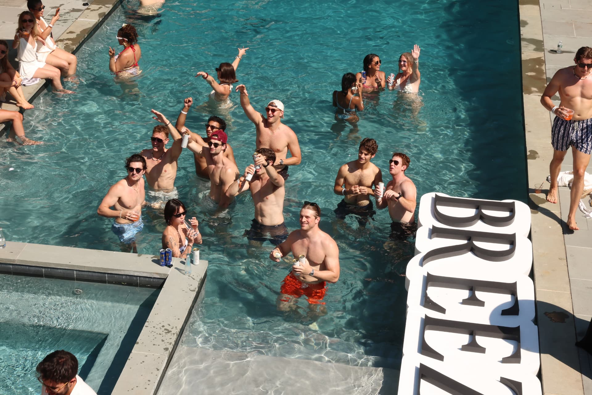 Poolside crowd at the Southampton white party
